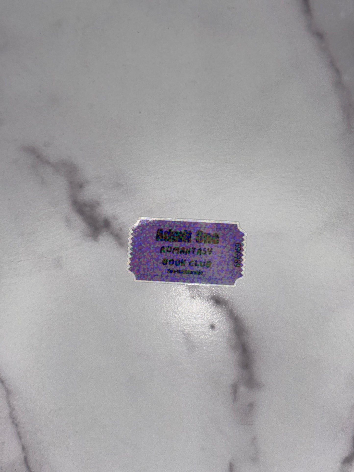 Purple ticket on a marble surface