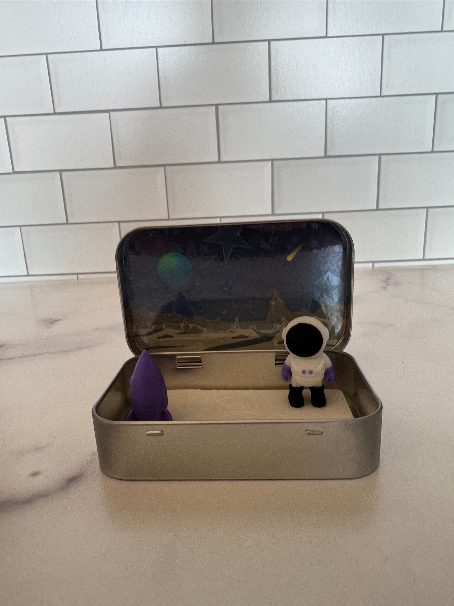 Blastoff! Space Play Tin – Astronaut Toy, Rocket & Moon Surface – In-Between Mint Gift, Kids Space Toy